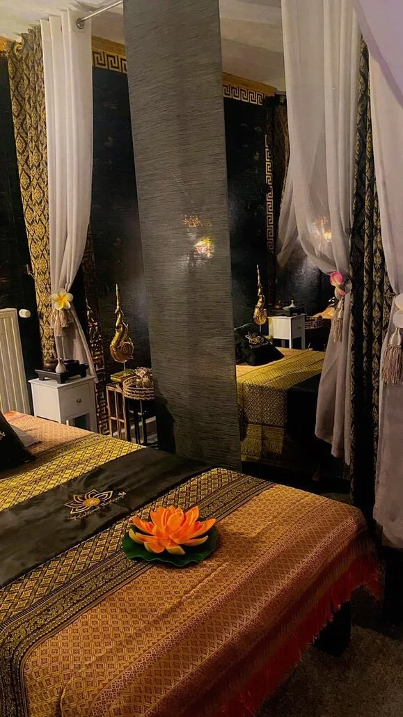 Professionally equipped treatment area with multiple massage beds